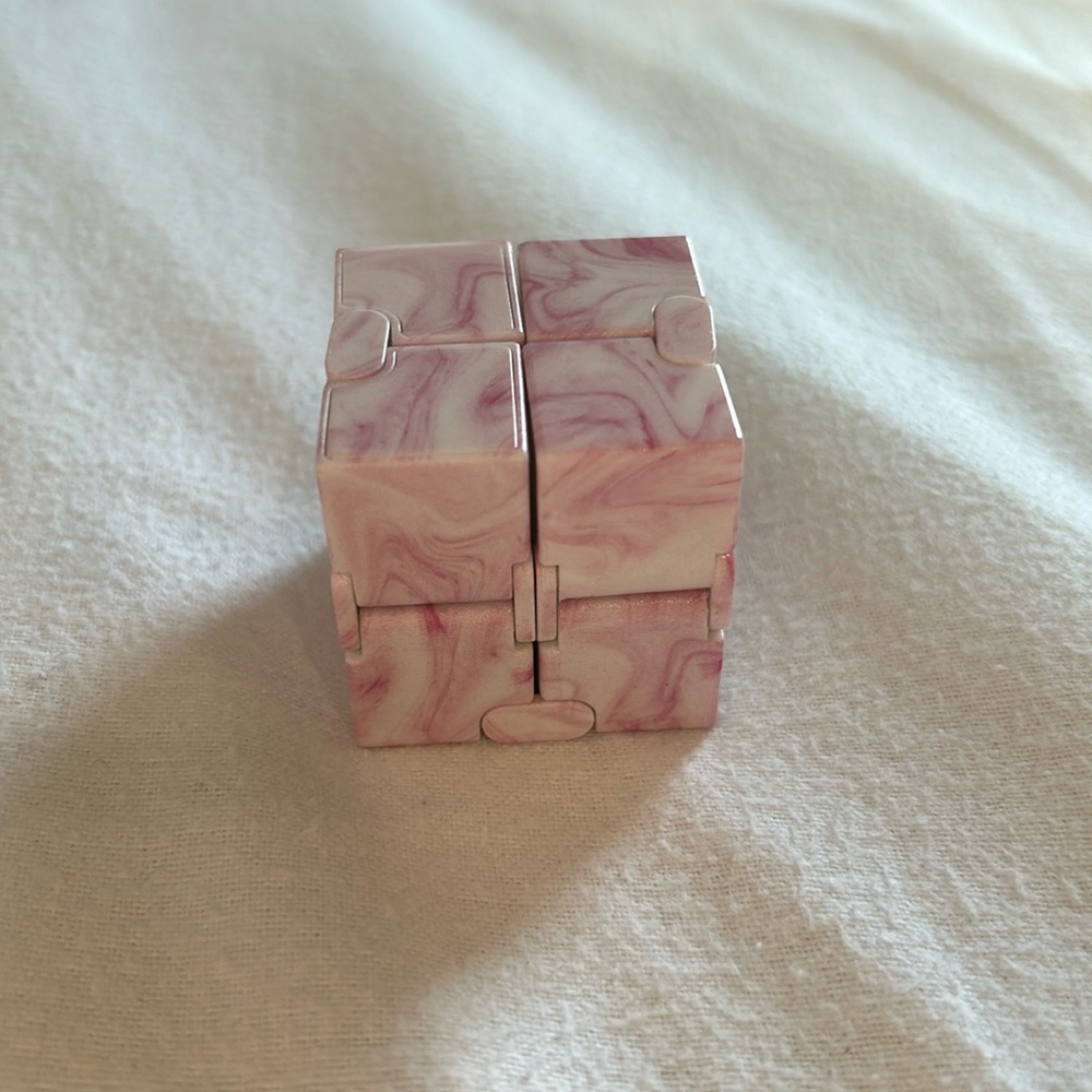 Pink marble infinity cube